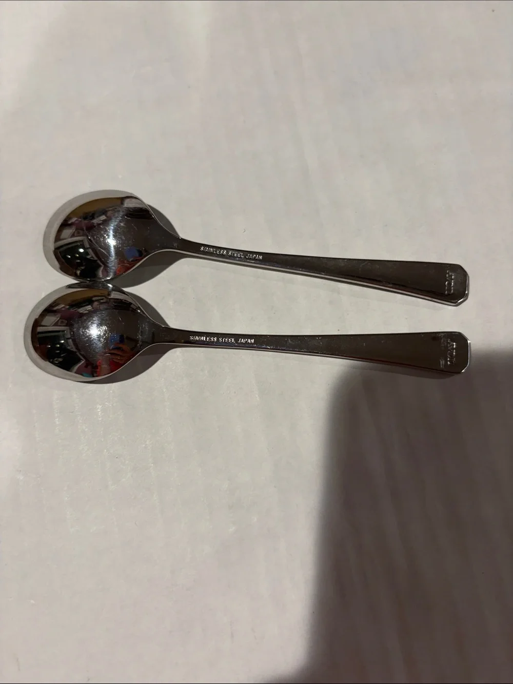 Avon collectors fruit spoons and hang rack